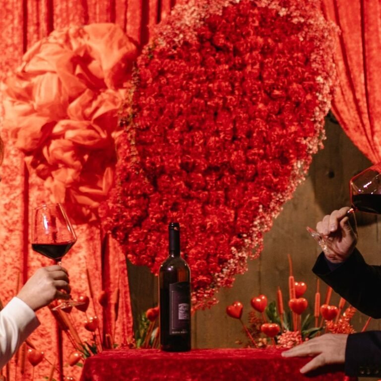A couple drinking together a glass with wine